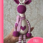 Adorable Hearty Crocheted Giraffe. Purple Crafted Giraffe with heart in the center of his chest || thecrochetspace.com
