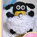 Amigurumi Baby Timmy Sheep. Crafted in black and white with yellowpacifier || thecrochetspace.com