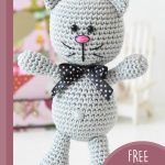 Amigurumi Kute Kitty Kat. Crafted in grey with blue polka dot ribbon around neck || thecrochetspace.com