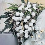 Beautiful Crochet Bridal Bouquet. Gorgeous white flowers in Green foliage. Long Bouquet || thecrochetspace.com