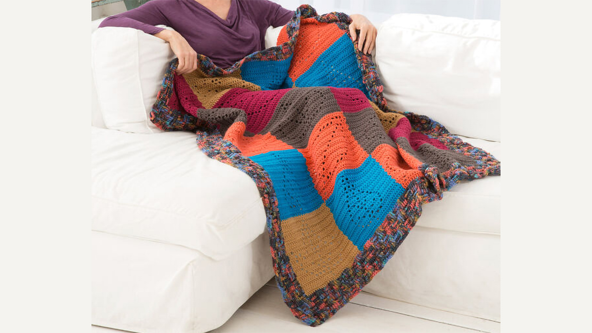 caring comfort crocheted throw || editor