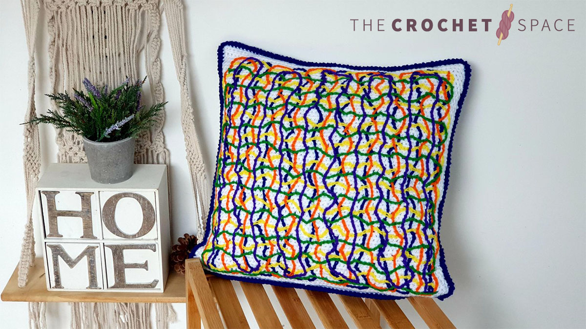Chaos Reigns Crochet Pillow || thecrochetspace.com
