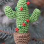 Christmas Cactus Crochet Ornament. Crafted in green with brown pot || thecrochetspace.com