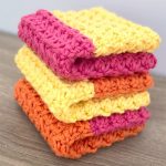 Color-Block Trinity Stitch Crochet Dishcloth. 3x folded and stacked dishcloths || thecrochetspace.com