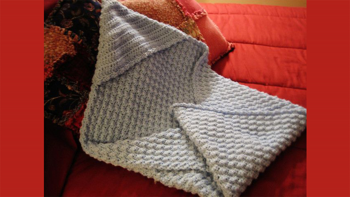 cosy crocheted hooded baby blanket || editor