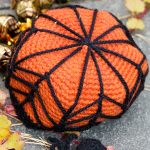 Creepy Candy Crocheted Basket. Upside down basket crafted in orange with black spiders web over and joined || thecrochetspace.com