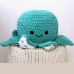 Crochet Baby Octopus Toy. Large turquoise head and white underside || thecrochetspace.com