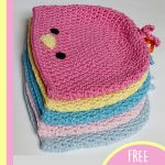 Crochet Bird Hat. Stack of 4 chick hats in different colors with eyes and a beak || thecrochetspace.com