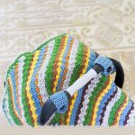 Crochet Car Seat Canopy. Crafted in green,blue and yellow stripes || thecrochetspace.com