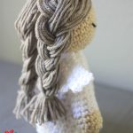 Crochet Christmas Angel Doll. The reverse side of the angel showing her long, plaited hair || thecrochetspace.com