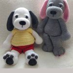 Crochet Cuddle Up Puppy. Two puppies, one in grey with no clothes on and one in red shorts and yellow t.shirt || thecrochetspace.com