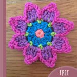 Crochet Flower Motif. 1x flower motif with pointed petals in pink and purple || thecrochetspace.com