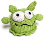 Crochet Green Monster. Round, bog-eyed creature || thecrochetspace.com