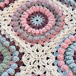 Crochet Mom Square. Pastel shades of blue and pink on beige background || thecrochetspace.com