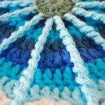 Crochet Spoke Mandala. Close up of inner madala circle crafted in shades of blue || thecrochetspace.com