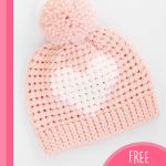 Crochet Valentine Heart Hat. Pink bobble hat with white heart || thecrochetspace.com