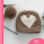 Crochet Valentine Heart Hat. Beige hat with white heart but no bobble || thecrochetspace.com