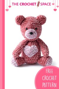 Crochet Velvet Valentine Bear. Pink bear with a pink heart on his tummy || thecrochetspace.com