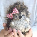 Crochet Woodland Hedgehog. With a red gingham bow in her hair || thecrochetspace.com