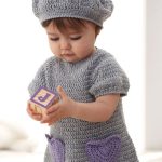 Crocheted Baby Heart Dress And Hat. Suit crafted in grey with purple, heart pockets || thecrochetspace.com