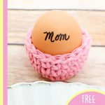Crocheted Egg Cup Cozy. One pink, egg cup cozy with the word Mum, written on the egg || thecrochetspace.com