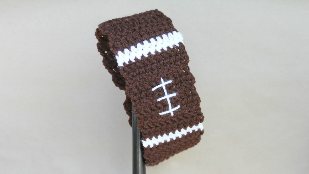 crocheted football ear warmers || editor