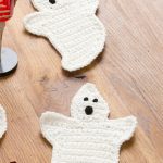 Crocheted Ghost Coasters. Two coasters in the shape of ghosts || thecrochetspace.com