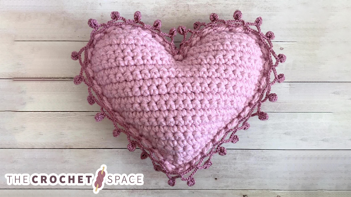 Crocheted Heart Shaped Pillow || thecrochetspace.com