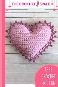 Crocheted Heart Shaped Pillow. Front image of completed pillow || thecrochetspace.com