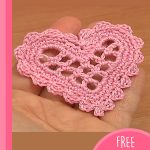 Crocheted Mesh Heart. Completely finished pink heart with edging || thecrochetspace.com