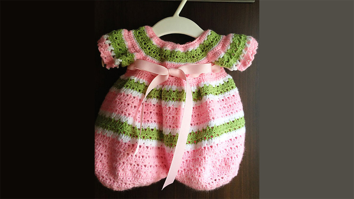 crocheted pink baby romper || editor