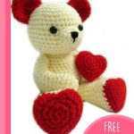 Crocheted Valentine Teddy Bear. Bear with red heart accents || thecrochetspace.com
