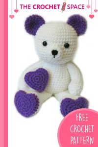 Crocheted Valentine Teddy Bear. Bear with heart purple accents || thecrochetspace.com