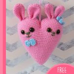 Cute Crocheted Bunny Hearts. crafted in pink with a rabbi head either side of the heart || thecrochetspace.com