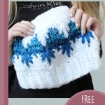 Deep Loop Crochet Hat. Crafted in blue and white. Hat being held in image || thecrochetspace.com
