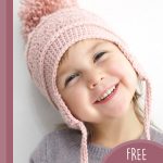 Easy Skiers Crochet Chullo. Pink hat with faux fur pompom on top || thecrochetspace.com