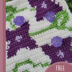 Flowering Vine Crochet Square. White background qith large purple flower heads and green leaves || thecrochetspace.com