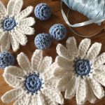 Fun Crochet Daisy Chain. Individual flowers and balls before threading onto chain || thecrochetspace.com