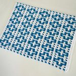 Geo Plush Crochet Rug. Ble ^ White Geometric style. View of entire rug. Rectangle thecrochetspace.com