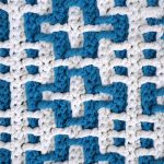 Geo Plush Crochet Rug. Blue and white geometric style rug. View Up close Tapestry style thecrochetspace.com