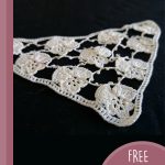 Granny's Lovely Crocheted Pansy. A doily of white, joined pansy heads in a triangle || thecrochetspace.com