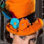 Halloween Crochet Top Hat.Brightly colored hat with fabulous trim and black net face netting | thecrochetspace.com