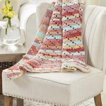 High Sierra Crochet Blanket crafted in self striping yarn in desert colors || thecrochetspace.com