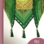 Lost In Time Crochet Shawl. Crafted in greens, shawl is shown hanging with 3x points down || thecrochetspace.com