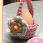 Lovely Crocheted Little Egg Baskets . One, pink basket with an attached flower and an egg in it || thecrochetspace.com