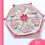Loving Crochet Heart Hexagon. hexagon crafte in white and pinks with hearts || thecrochetspace.com