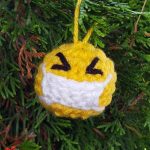 Mask Up Crochet Ornament. Hanging on the Christmas Tree || thecrochetspace.com