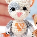 Micro Kitty Cats Amigurumi. Large, Micro Cat crafted in grey and white. Full frontal image || thecrochetspace.com