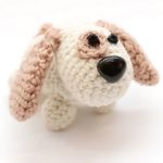 Adorable Crocheted Puppy. Side view of puppy, with big patch under right eye || thecrochetspace.com