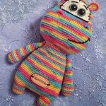 Playtime Crochet Rainbow Hippo. Crafted in strips of pink, yellow and blue || thecrochetspace.com
